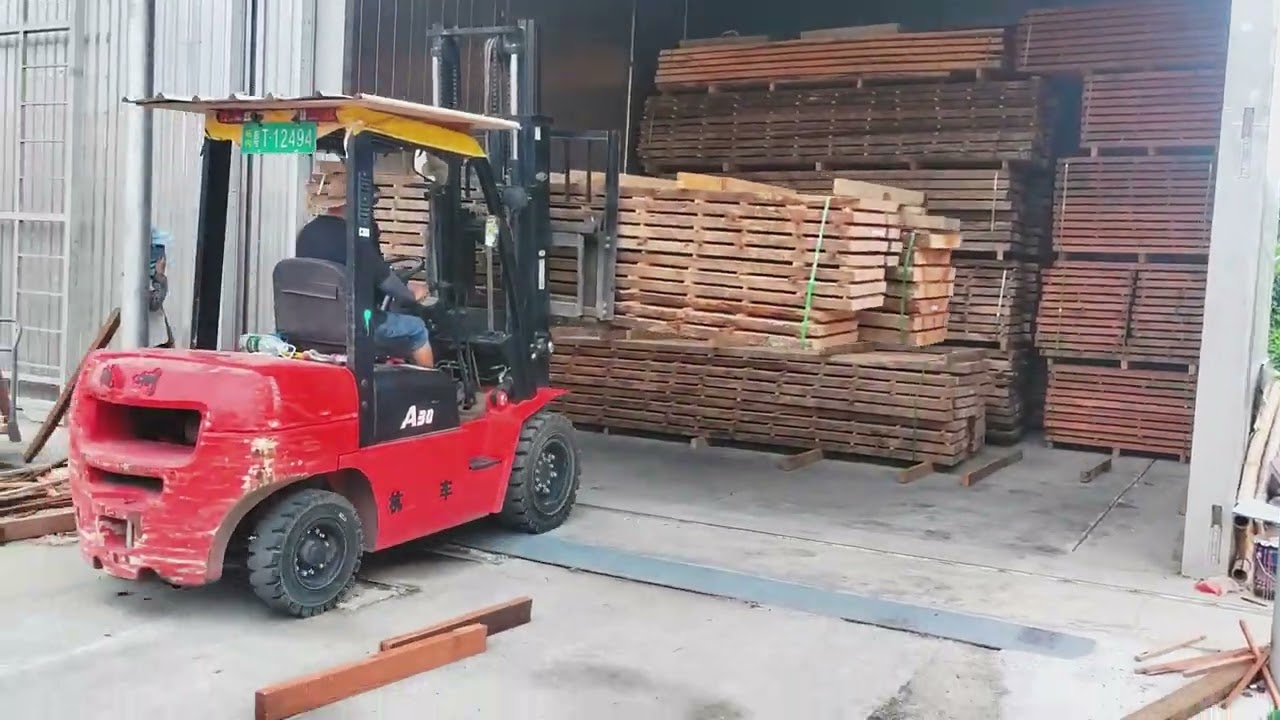 Forklift Loader Load Lumber into a Dry Kiln