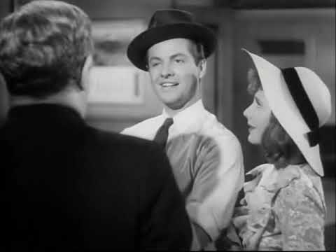 The Devil and Miss Jones (1941).   Bob Cummings gives a cop what for.