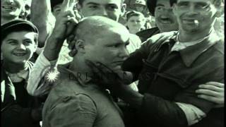 A woman collaborator with shaved head marched  after the Liberation of Paris duri...HD Stock Footage