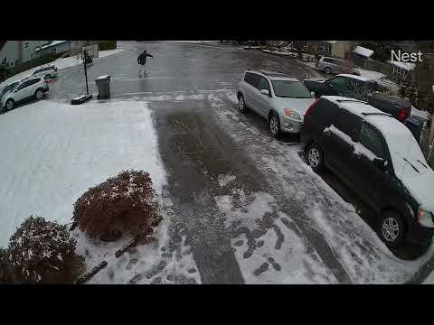Seattle Ice Storm 12/23/2022 (caught on security camera, ice skating on the street Merry Christmas)
