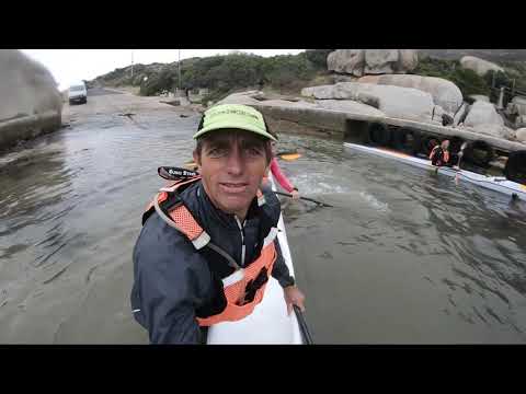 Downwind Paddling a triple surfski with my brother and Vinnie.