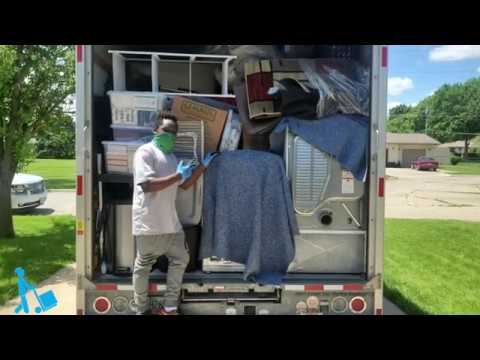 Part of a video titled How to use ratchet straps in a moving truck - YouTube