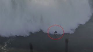 Surfer gets wiped out scaling 60ft wave off Nazare beach