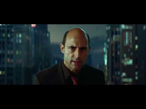 Kick-Ass 2 trailer frame — Hit-Girl, Kick-Ass, Colonel Stars and Stripes lined up against a neon skyline