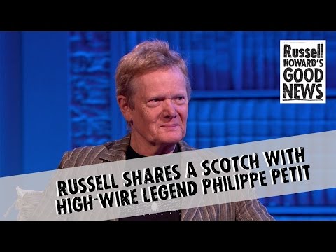 Russell shares a scotch with high-wire legend Philippe Petit
