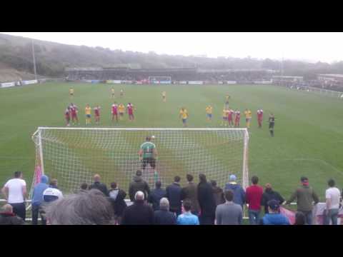 Matt Rhead scores a penalty and tells abusive fans to be quiet....
