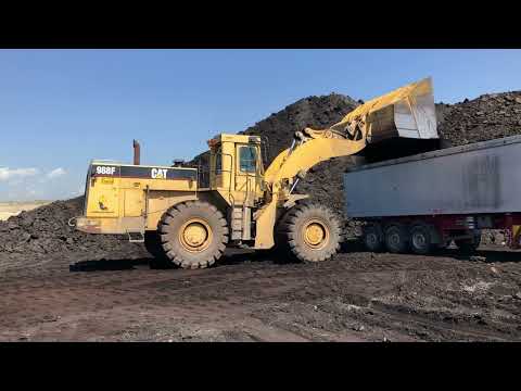 Caterpillar 988F Wheel Loader Loading Mercedes And MAN Trucks With Coal - Labrianidis Mining Works