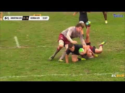 Demur Tapladze and Ioane Iashaghashvili try saving play to deny Mateo Carreras