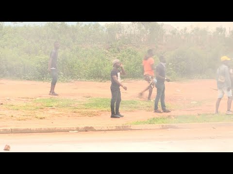 Demonstrators clash with police near South African businesses in Nigeria | AFP