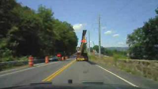 preview picture of video 'pilotcar.tv - Steel Bridge Beams SR 9W Road Construction Haverstraw NY 129' Long 34' Overhang'