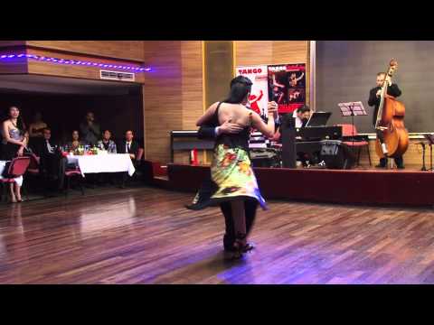  Sebastian Jimenez  and  Maria Ines Bogado  are  dancing  to  a  tango  at  Shanghai Tango Marathon  in  2013