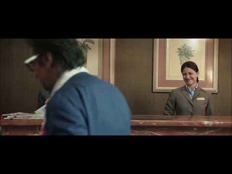 Danny Collins trailer still featuring Al Pacino with concert lights in background — soundtrack focus