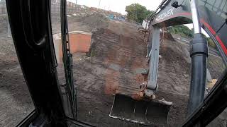 Excavators Top Soiling Swale Batter....