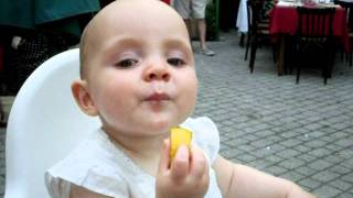 preview picture of video 'Baby eats a lemon (and likes it!)'