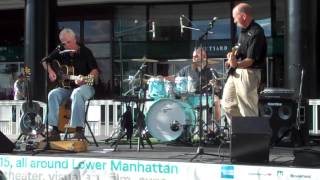 Angelo M Trio Performs Woody Guthrie's "Goin' Down The Road Feeling Bad" on the WFC Plaza