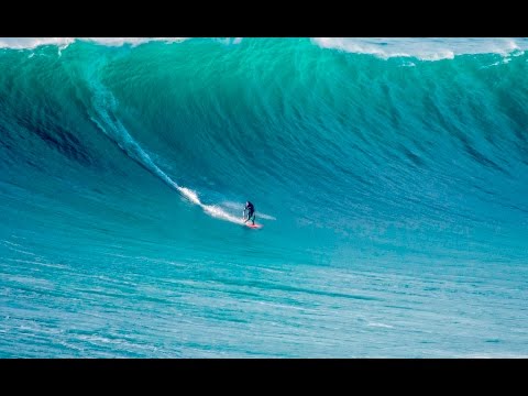 Nazaré,  Portugal  - Surfer Thiago Jacaré  big waves