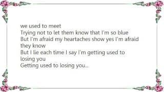 Buck Owens - Getting Used to Losing You Lyrics