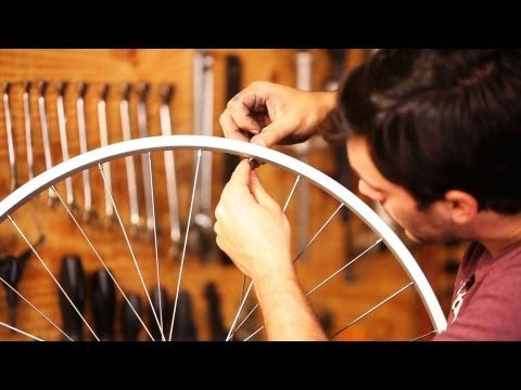 replace bike spoke cost