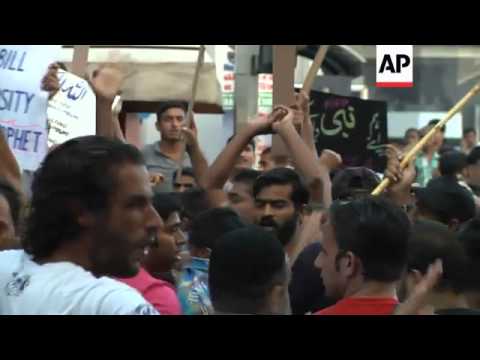 Demonstrators clash with police in protest over anti-Islam film