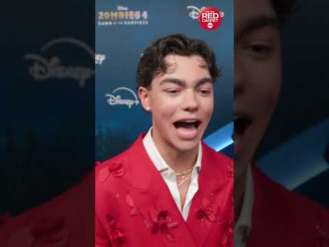 Malachi Barton approves of Meg Donnelly's look and date at the "zombies 4" premiere