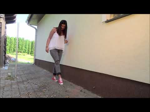 Woman with red converse walking near a group of snails