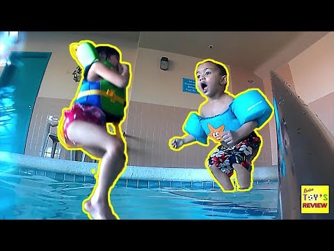 Swimming time again at Days Inn Calgary by Phobe and Rawson