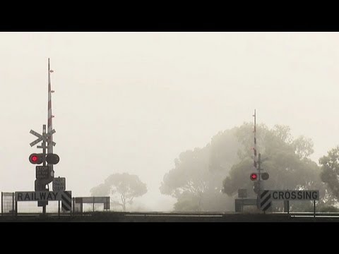 Level Crossing & V/line V/locity Passenger Train in Fog (8/12/2011) - PoathTV Australian Railways