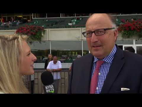 Maggie Wolfendale talks with Christophe Clement after the 2017 Belmont Turf Sprint Invitational