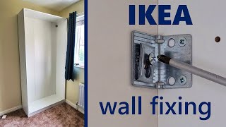 How to attach Ikea wardrobe to the wall