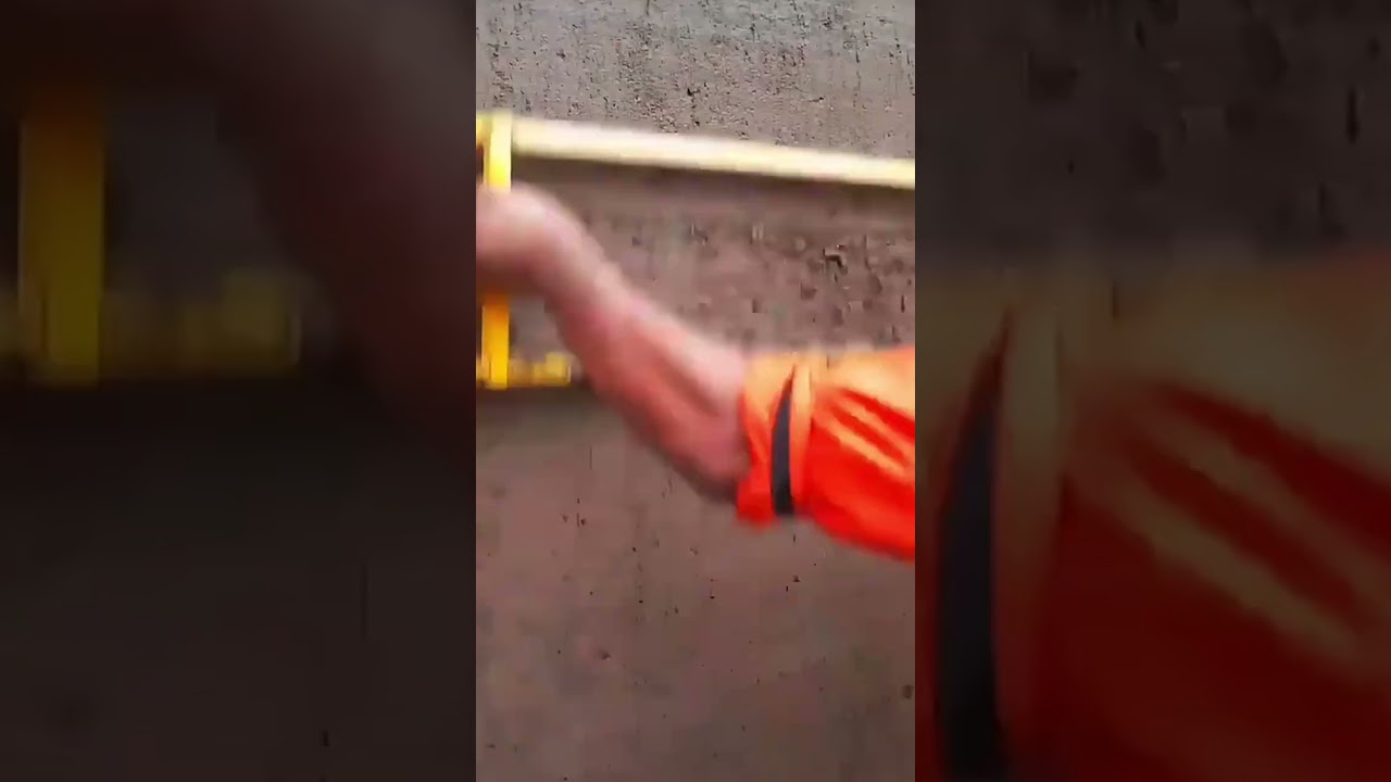 the process of leveling cement mixture on the walls outside a building using simple tools #popular