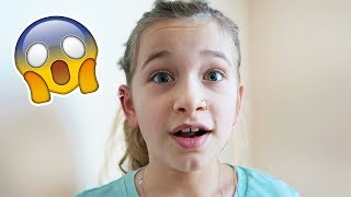 9 YEAR OLD GETS A NOSE RING! | JKrew