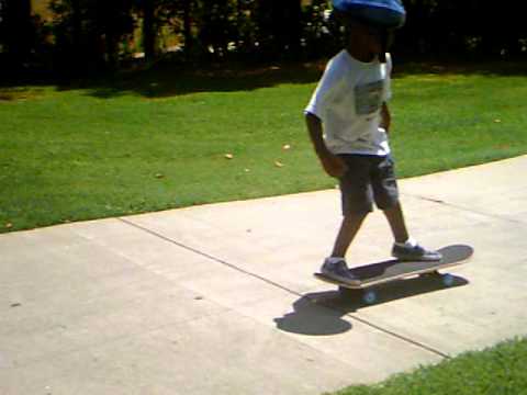 kid thats 5 years old try to skateboard