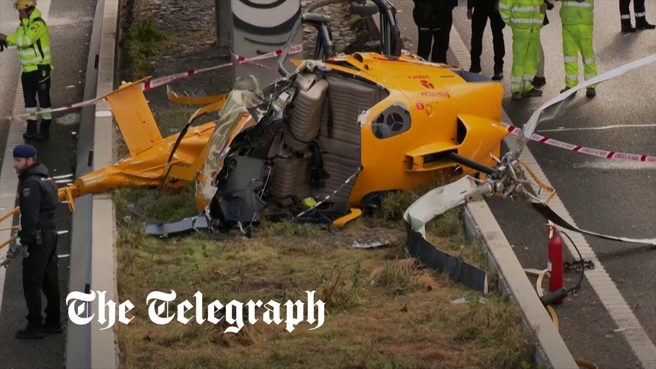 Helicopter crashes into car on busy Madrid ring road