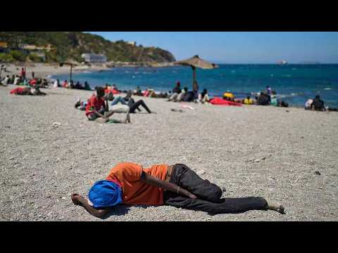 Live: View of migrants and security forces at beach in Spain's Ceuta