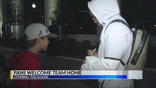 Alabama fans greet football team