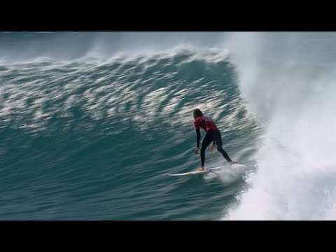 Shark swims & jumps as surfer lands perfect 20 heat total