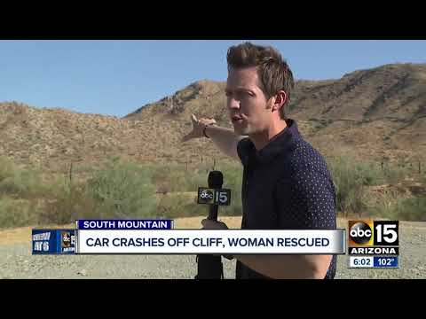 Car crashes off cliff, woman rescued