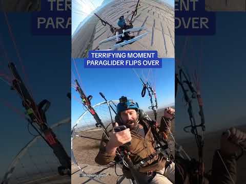 Terrifying moment paraglider falls out of the sky