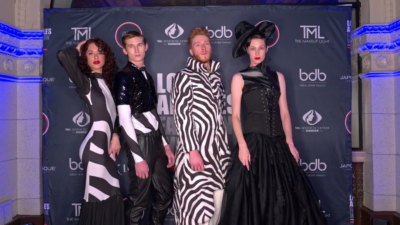 Ava Cherlyn poses with Idol Jose Models backstage at Artheartsfashion LAFW
