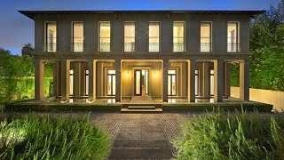 Twenty-two rooms, a home theatre and roman columns... and the man who spent six years