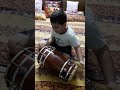 Child Playing DHOLKI