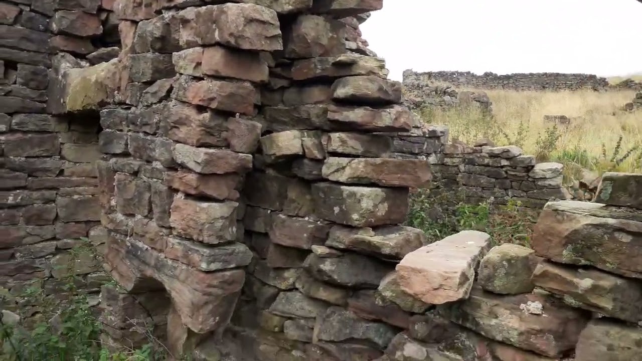 OLDEST FARMHOUSE I,VE EVER FOUND..WILDMAN BOOTS ON THE GROUND...