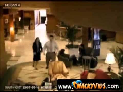 Angry businessman goes insane in hotel lobby