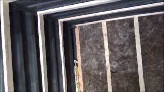 English version: Framing a 20' shipping container. Insulating & finishing.
