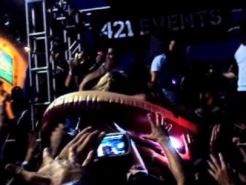 Steve Aoki sending a girl crowd surfing in an inflatable boat!