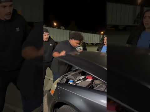 THE WHOLE GROUP STOPPED WHEN HE REACHED INTO THE ENGINE