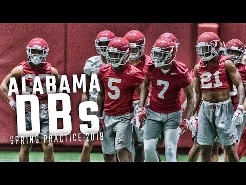 Nick Saban practices with Alabama defensive backs during Day 1 of spring practice