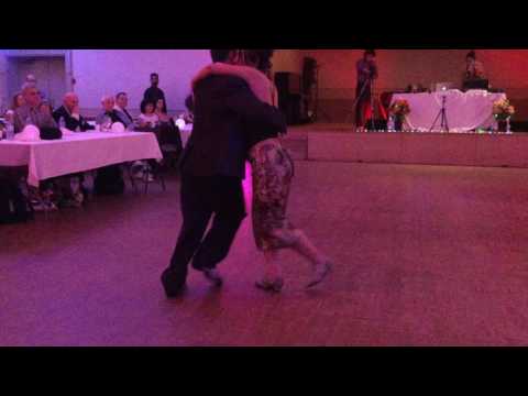  Marisol Morales  and  Alejandro Larenas  are  dancing  to  a  tango  at  Toronto Tango Festival  in  2016