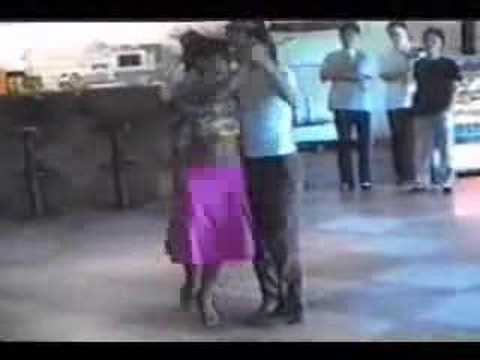  Javier Rodriguez  and  Geraldine Rojas  are  dancing  to  the  tango  "  En Esta Tarde Gris  "