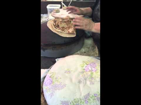 Carmel market laffa bread by druze  woman